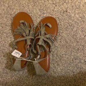 I am selling a pair of leather sandals.